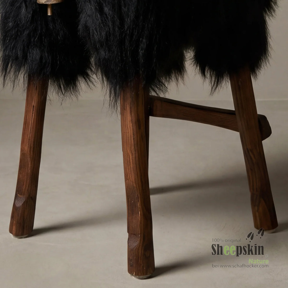 Sheep bar stool Bua »Joe« made of genuine Icelandic sheepskin – Black-Brown