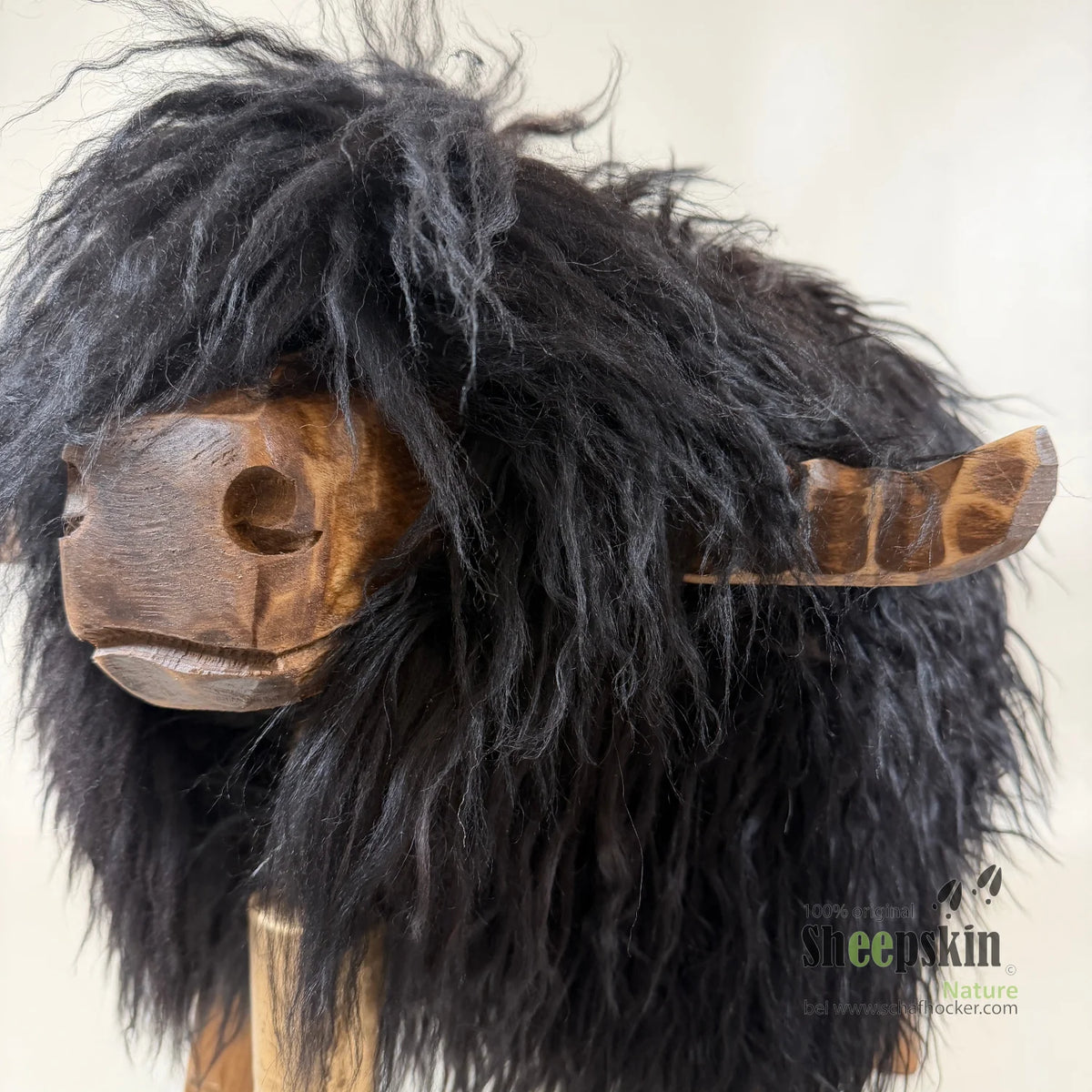 Pouf Bully »Bully« in vera pelle di pecora – Nero-marrone