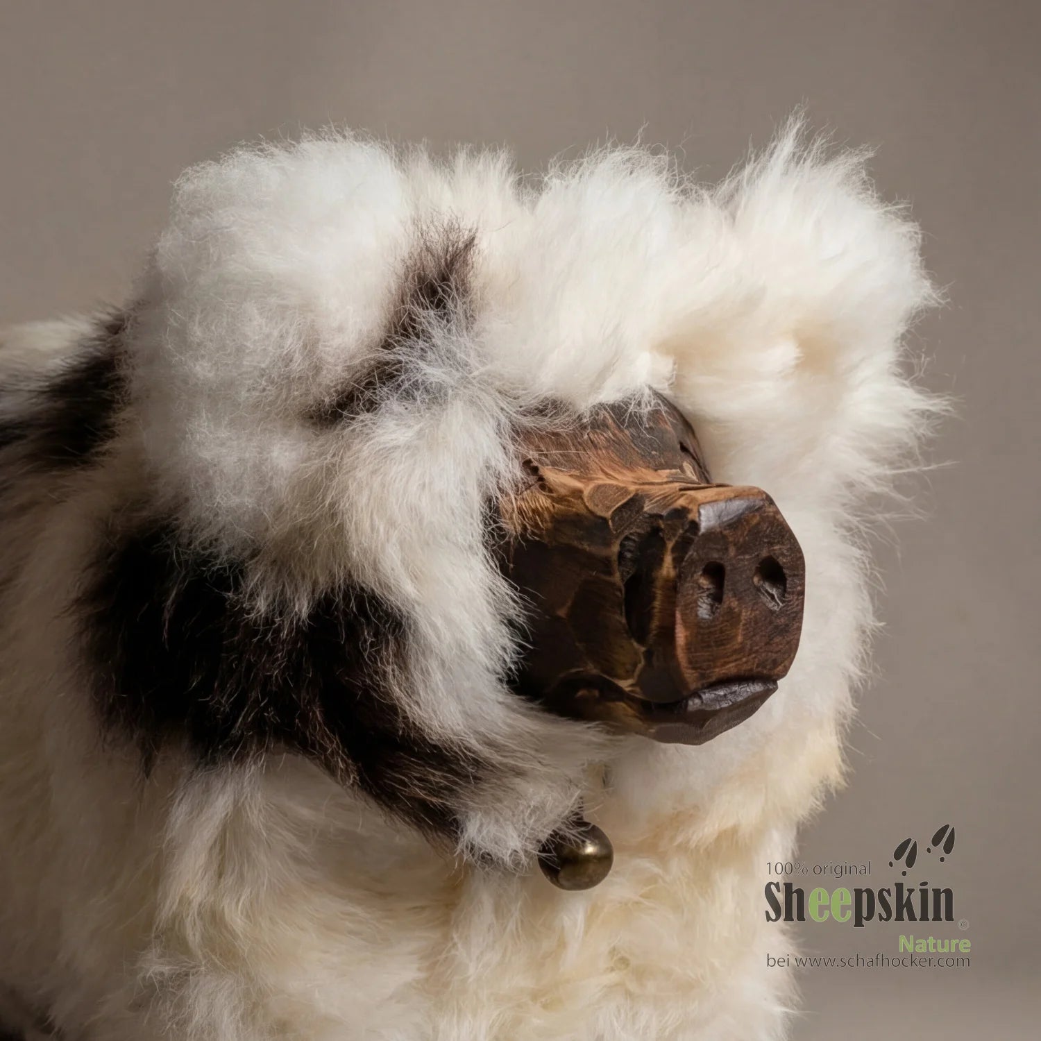 Schweindl sheepskin stool »Grunzi« made from genuine German sheepskin – white and brown