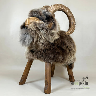 Sheepskin Schafhocker Premium Design Bruno der Steinbock braun limited