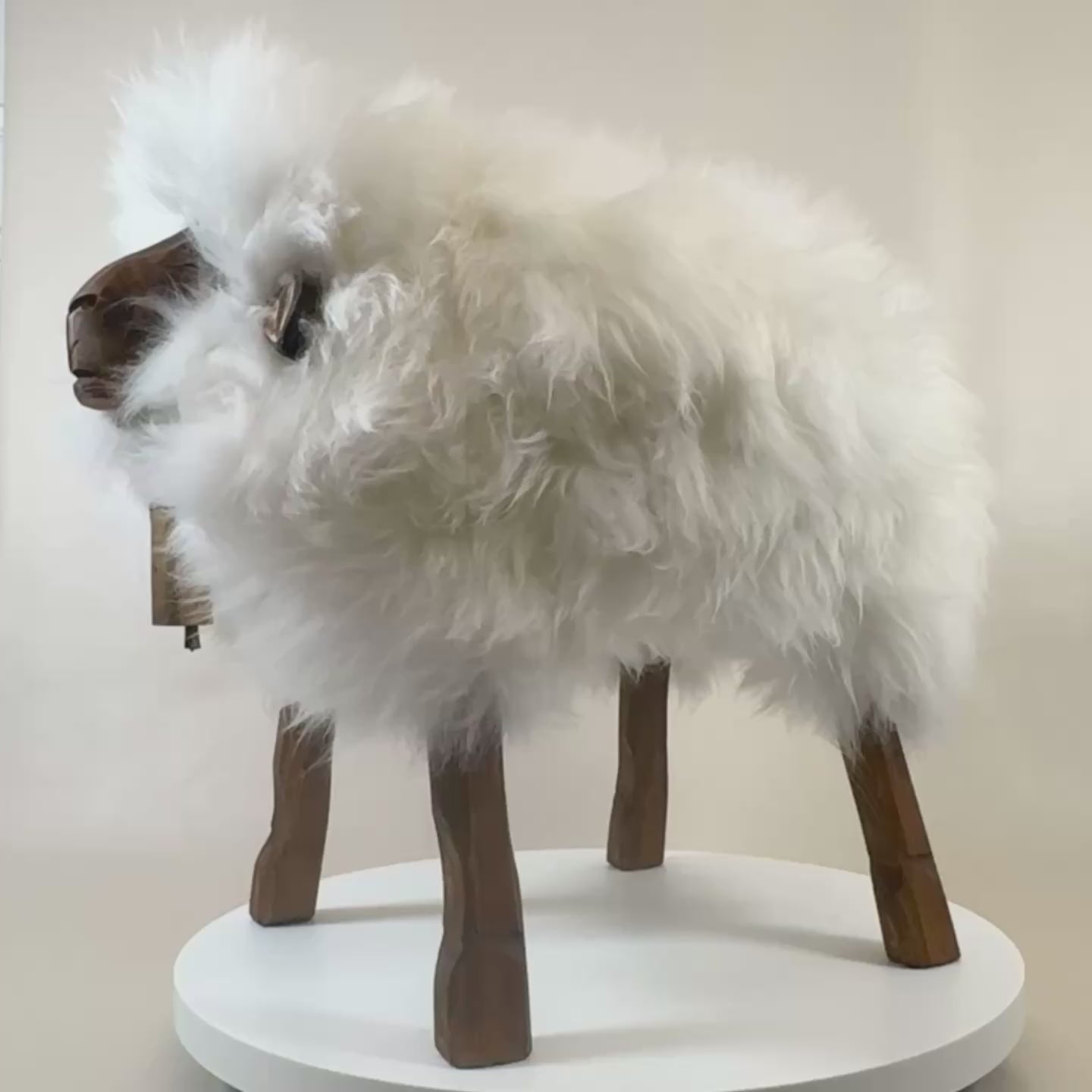 Load video: Premium sheep stool "Helga" the cheeky girl polar bear white